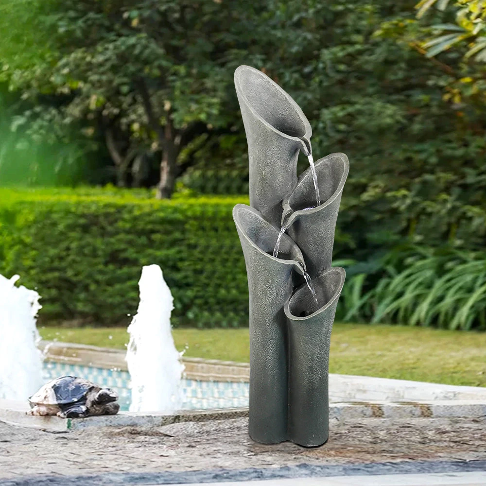 a fountain of fun - children playing interactive water fountain in backyard