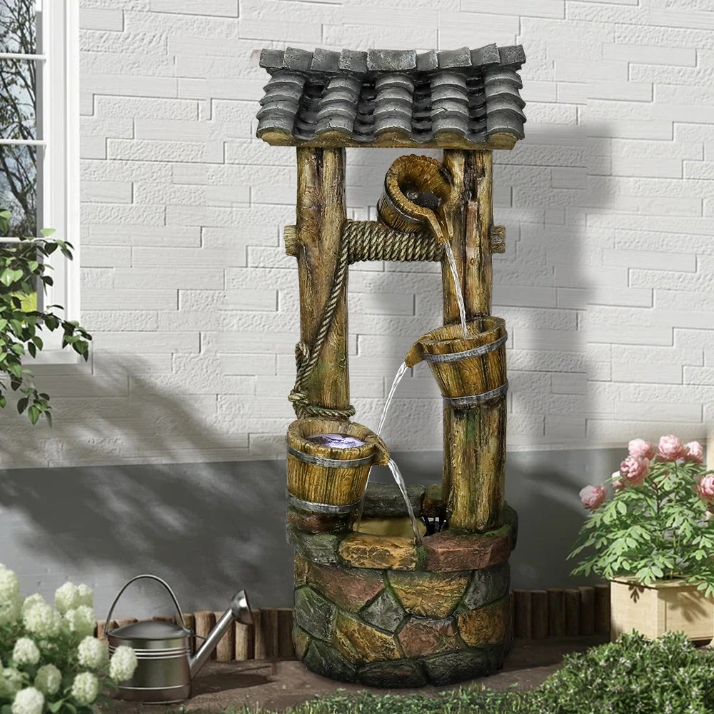 backyard drinking fountain - golden retriever using outdoor pet fountain